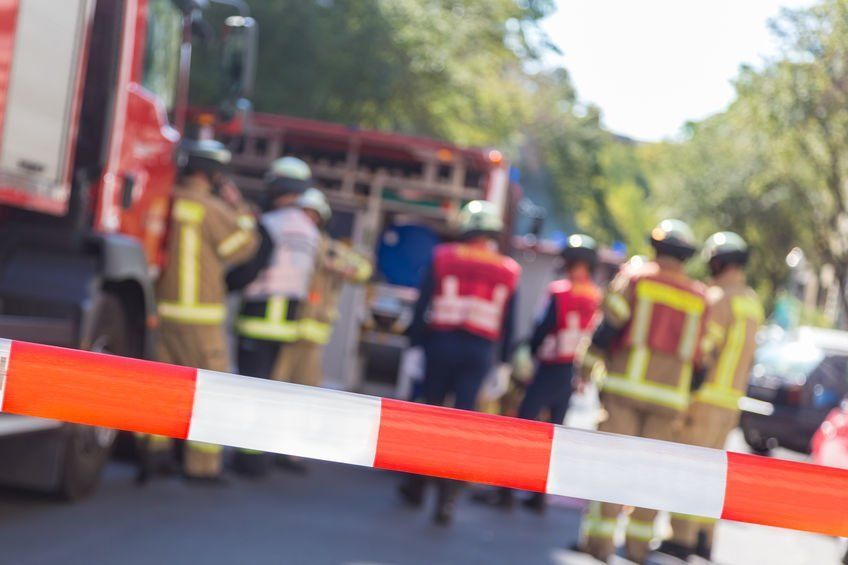 Firefighters tending to truck accident