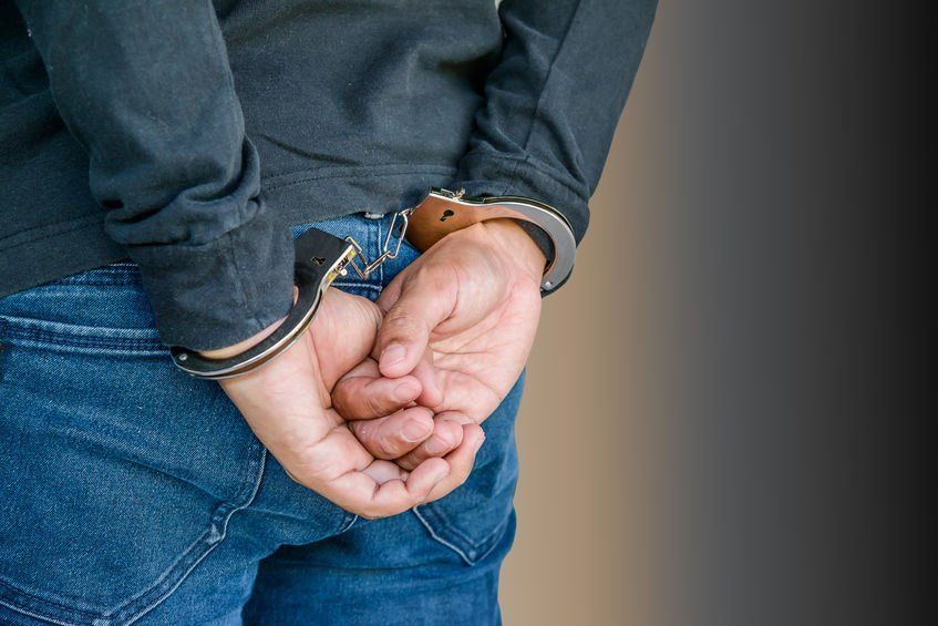 A man in handcuffs