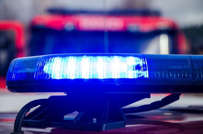 A close up of a blue light on top of a fire truck.