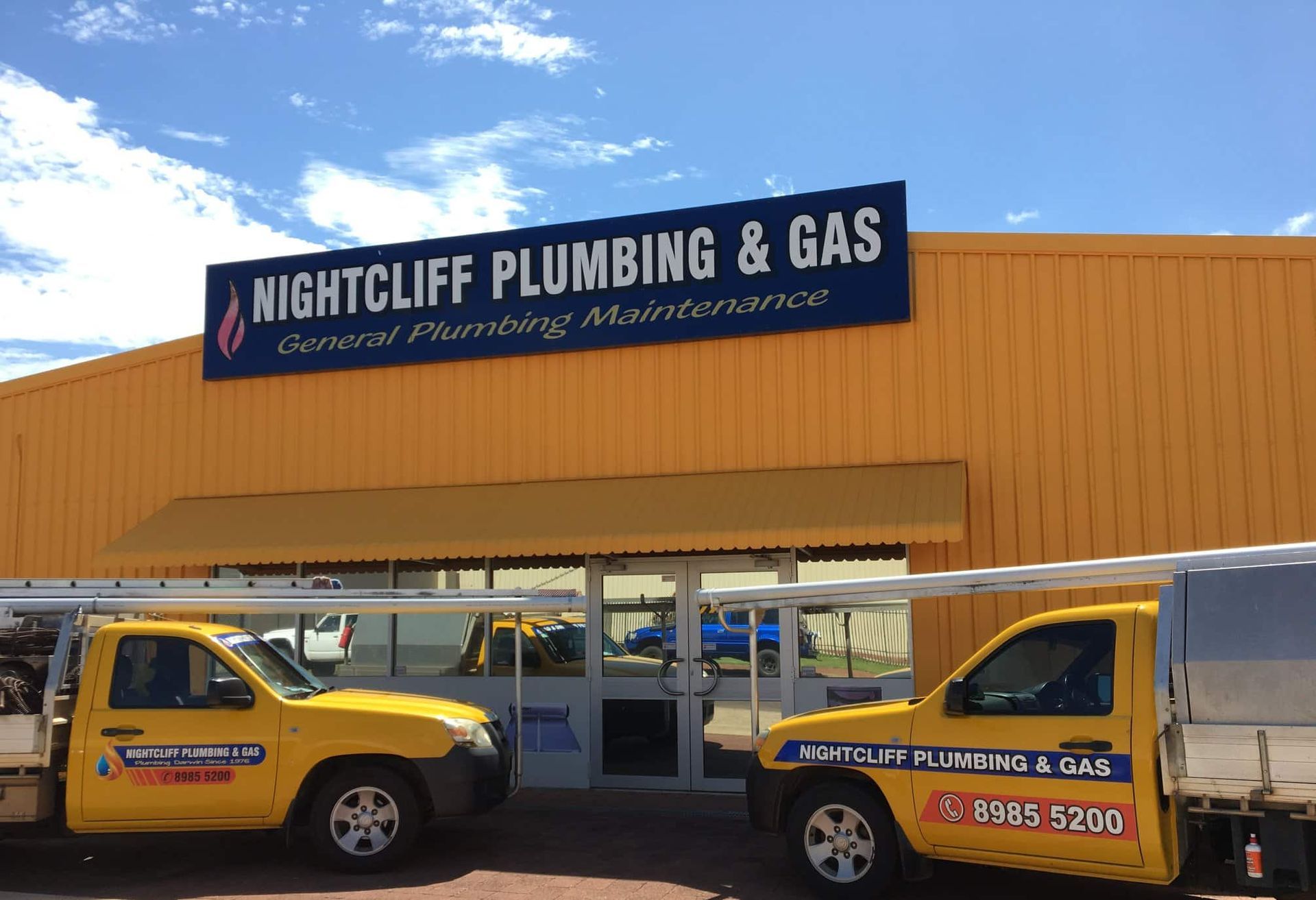 A Man in a Hard Hat is Working on a Construction Site — Nightcliff Plumbing & Gas In Coconut Grove, NT