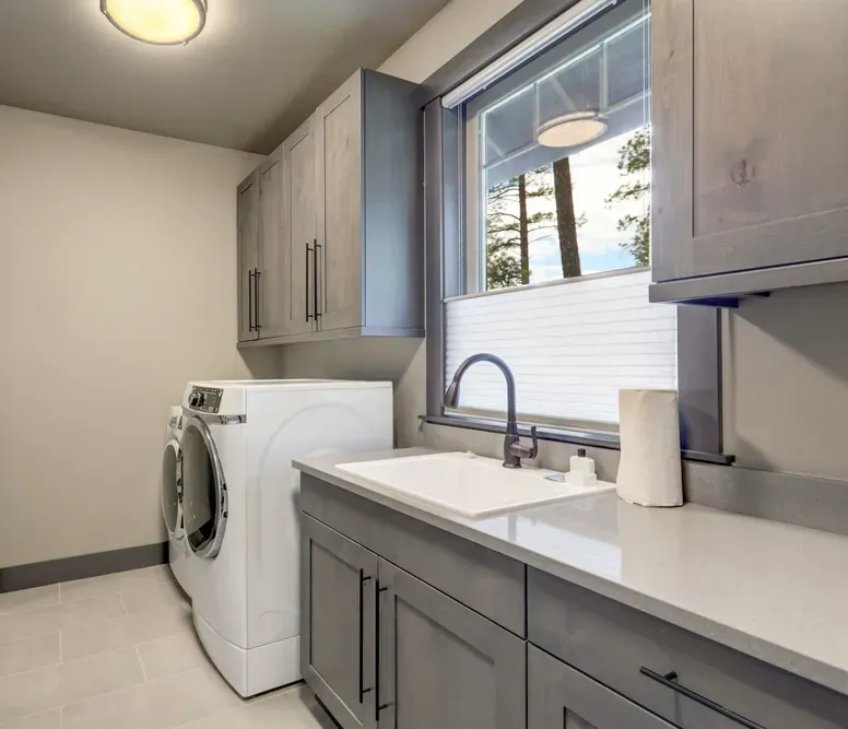 A Renovated Laundry with Sink and Cupboards — Nightcliff Plumbing & Gas In Coconut Grove, NT