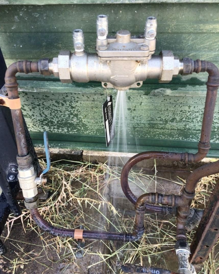 A Close Up of a Pipe With Water Coming Out of It — Nightcliff Plumbing & Gas In Coconut Grove, NT