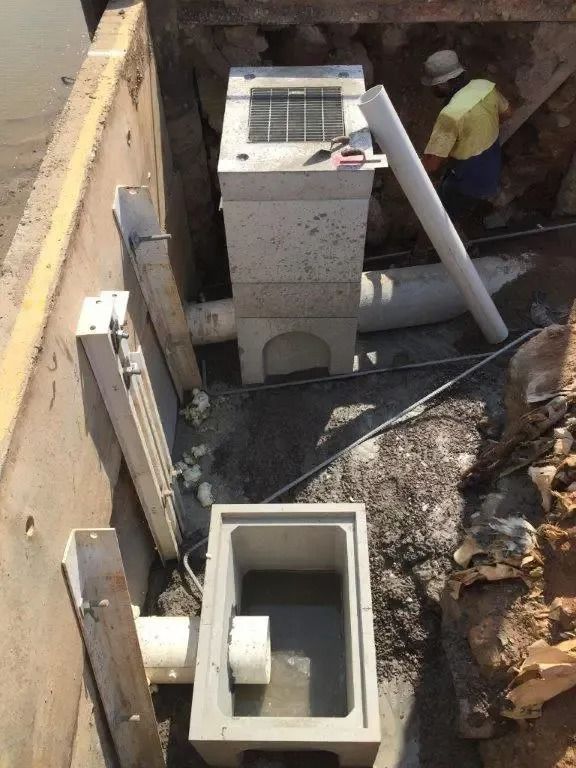 A Man in a Hard Hat is Working on a Construction Site — Nightcliff Plumbing & Gas In Coconut Grove, NT