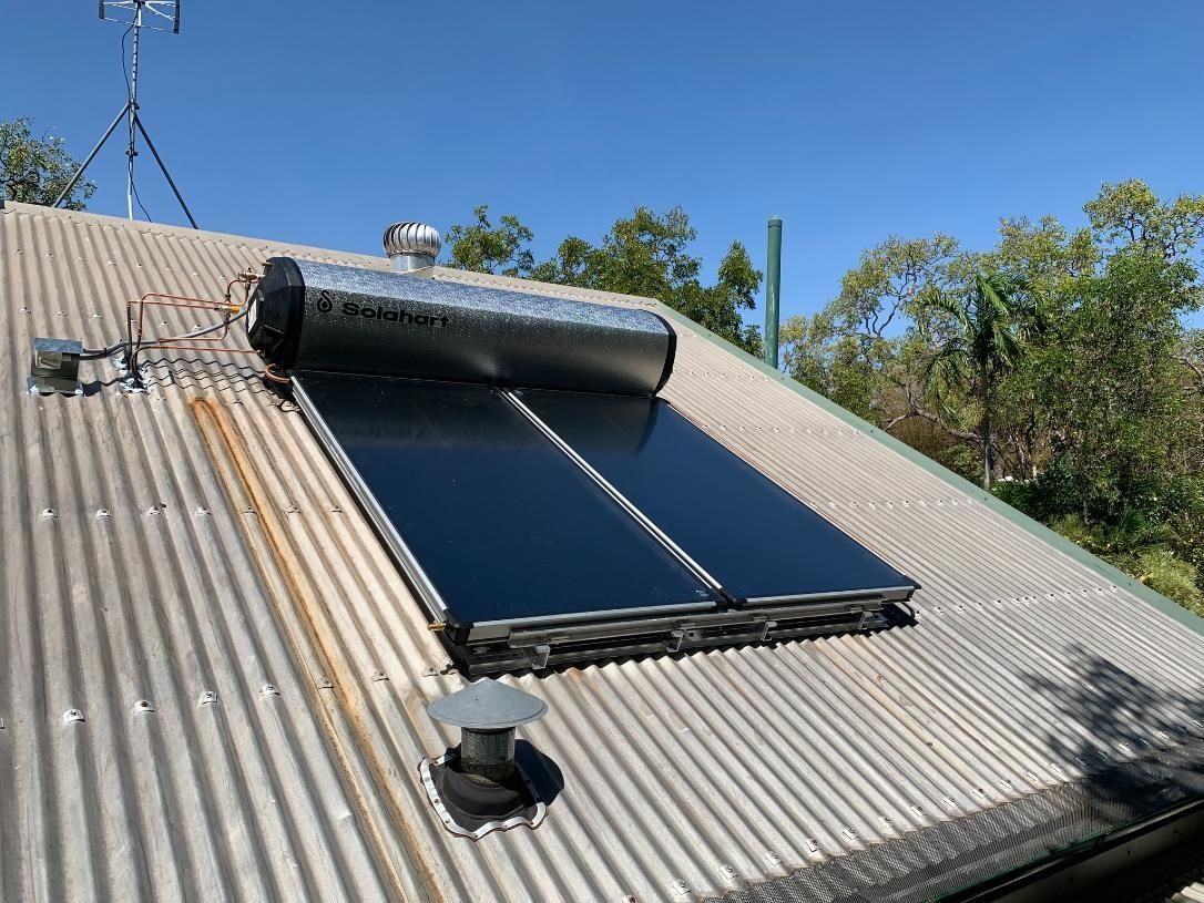 A Solar Water Heater is on the Roof of a House — Nightcliff Plumbing & Gas In Casuarina, NT
