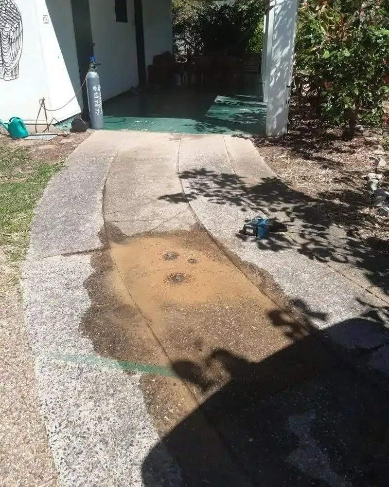 A Concrete Walkway With a Hole in the Middle of It — Nightcliff Plumbing & Gas In Coconut Grove, NT
