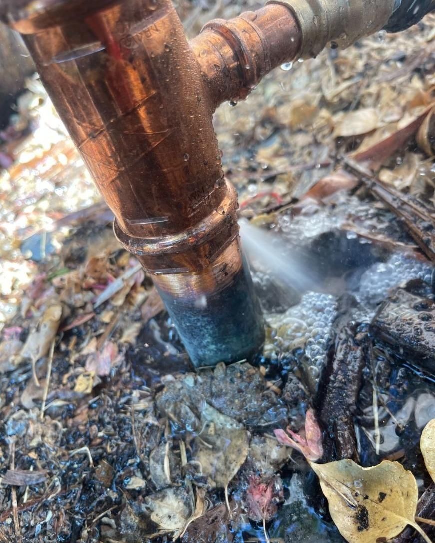 A Close Up of a Copper Pipe on the Ground — Nightcliff Plumbing & Gas In Casuarina, NT