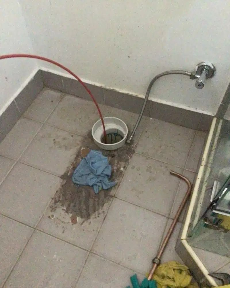 A Blocked Drain Being Cleaned With A High Pressure Jetter — Nightcliff Plumbing & Gas In Humpty Doo, NT