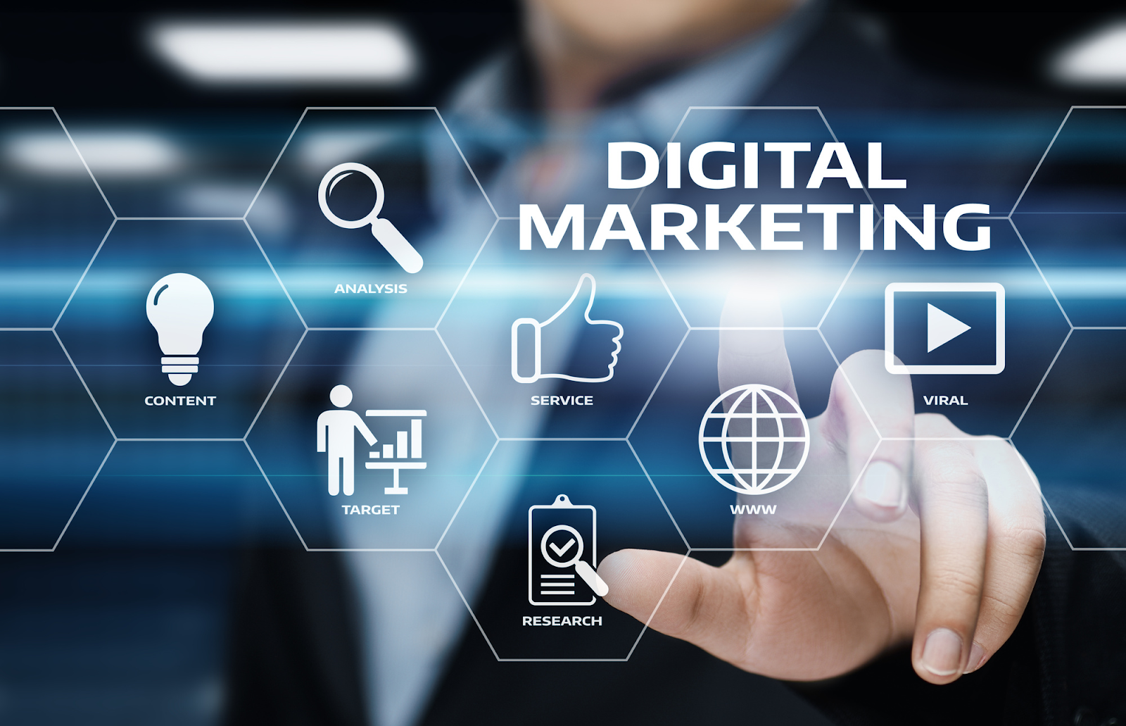 A man is pressing a button on a digital marketing screen.