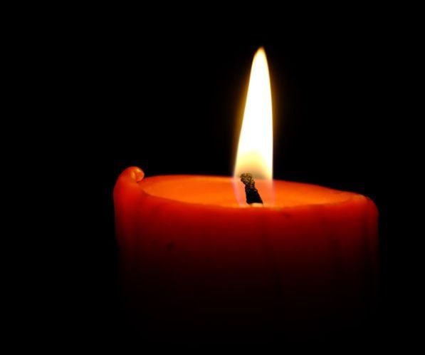 Lit memorial candle symbolizes remembrance at funeral homes in Milton-Freewater, OR, honoring loved