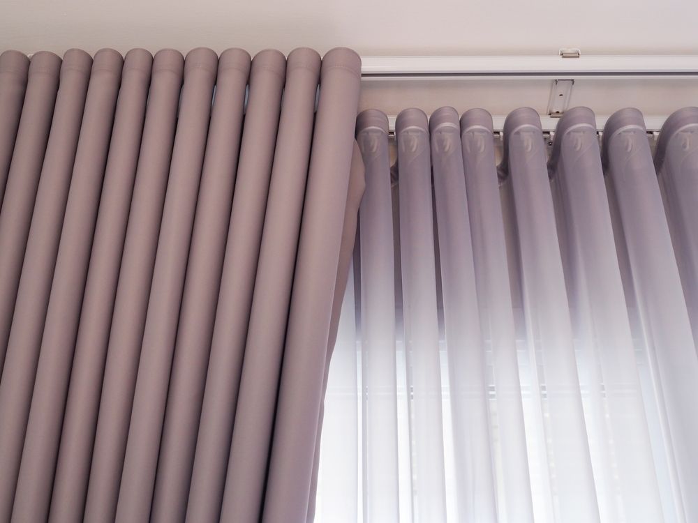 A Close Up of a Pair of Purple Curtains on a Window — TT Shutters & Shading In Mullumbimby, NSW