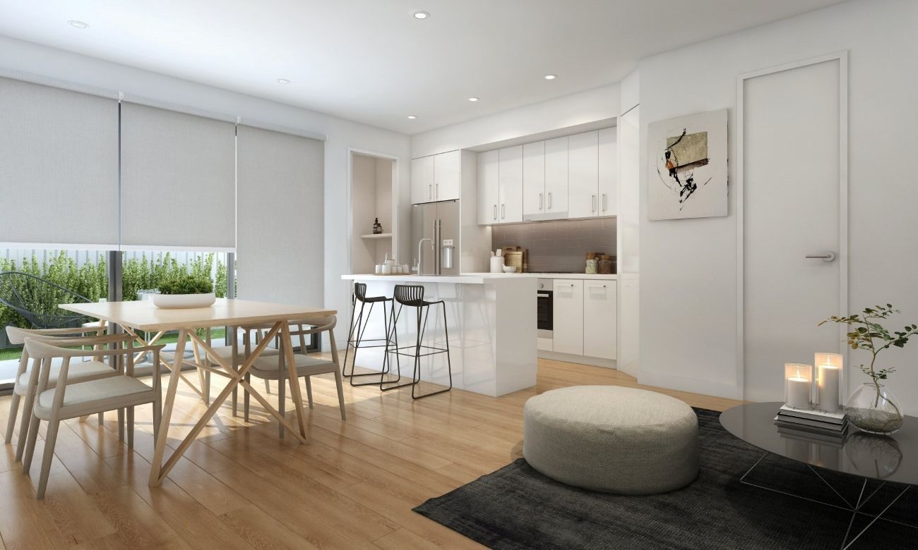 A Living Room With a Table and Chairs and a Kitchen — TT Shutters & Shading In Ballina, NSW