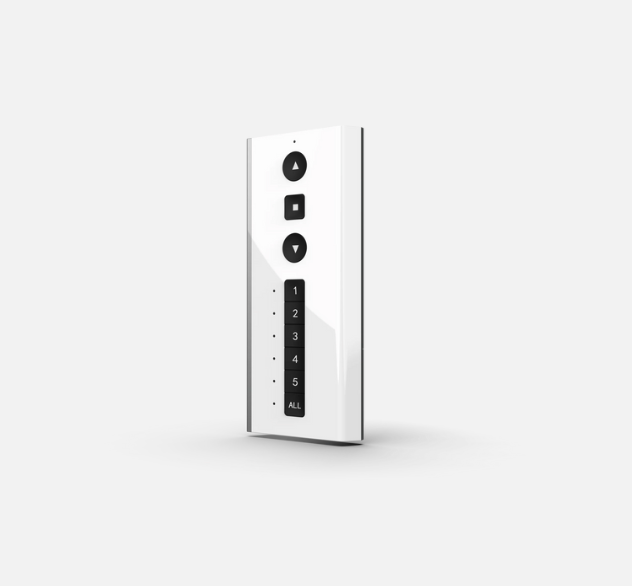 A White Remote Control With Black Buttons On It — TT Shutters & Shading In Ballina, NSW