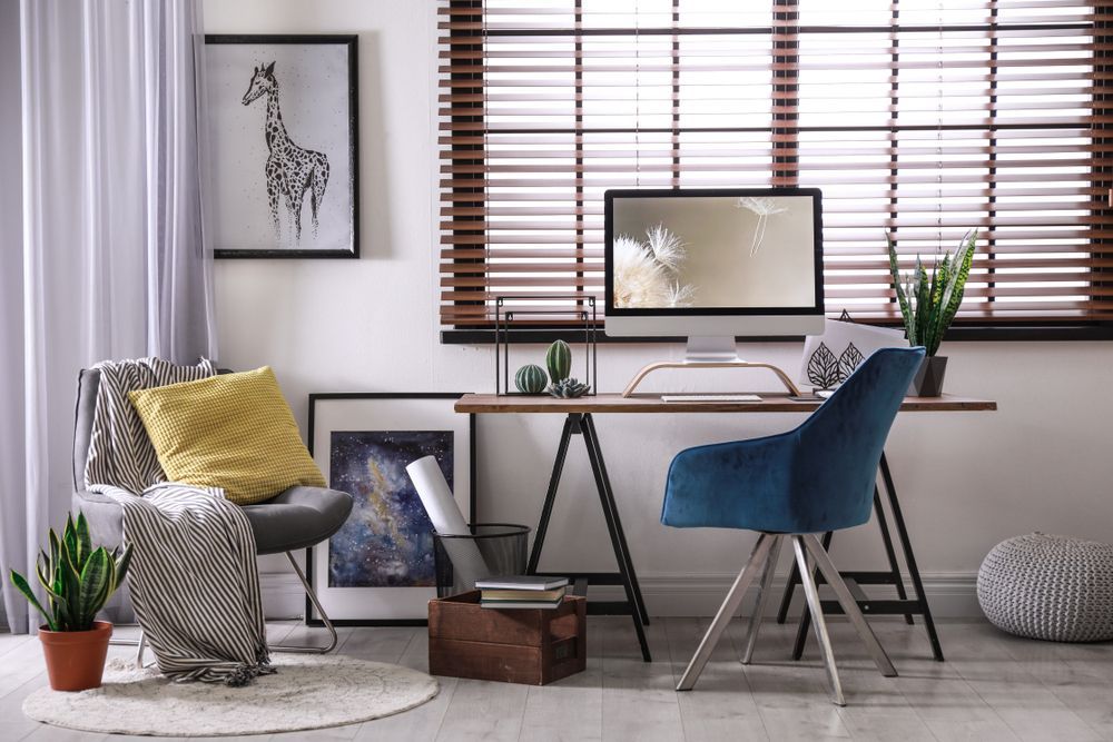 A Living Room With a Desk, Chair and Computer — TT Shutters & Shading In Ocean Shores, NSW