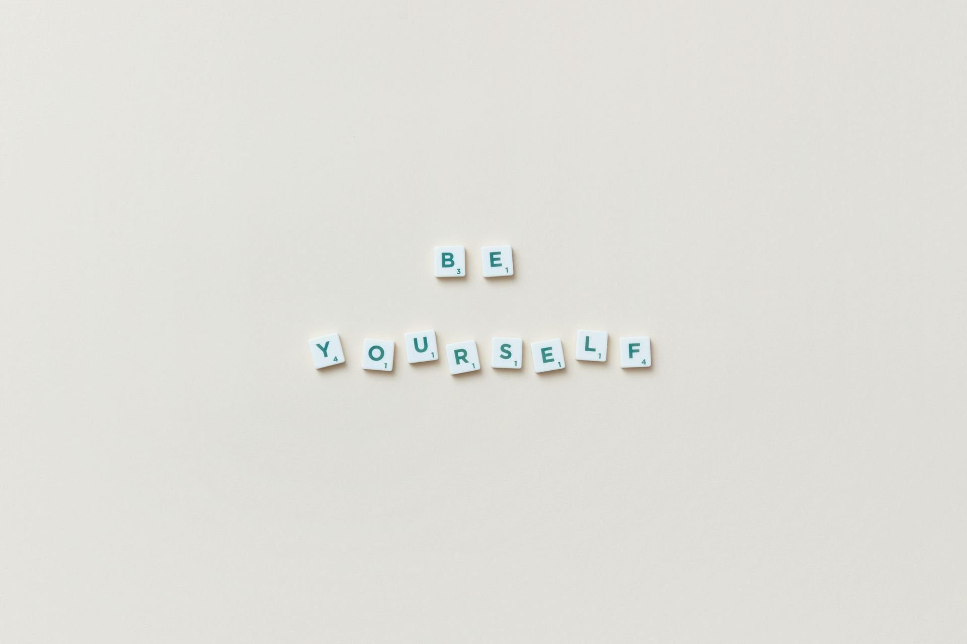 White letter tiles spelling