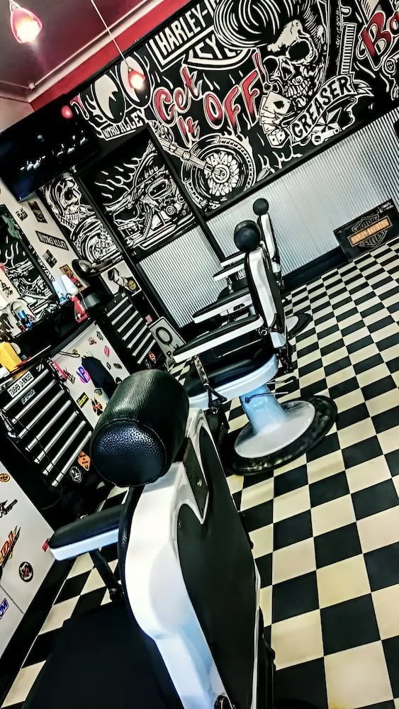 A Barber Shop With A Checkered Floor And A Barber Chair — The Barber Social In Raymond Terrace, NSW