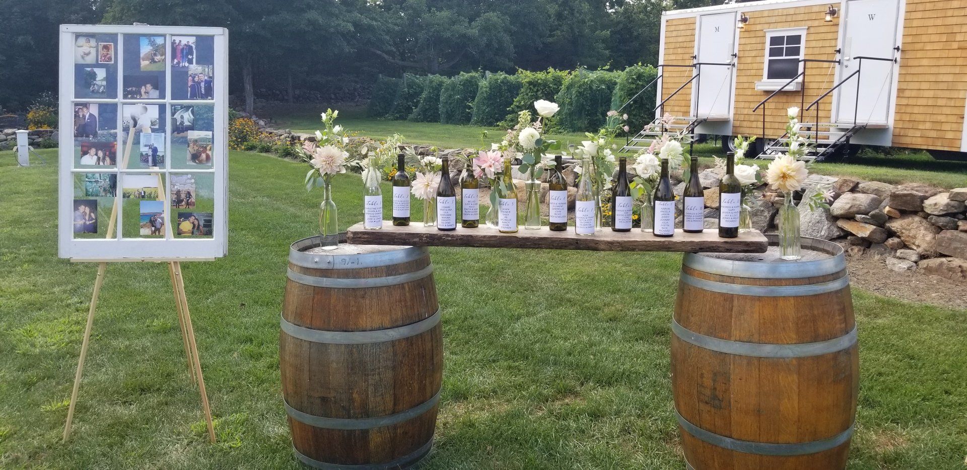 Seating Assignments on Wine Bottles at Vineyard Wedding Venue