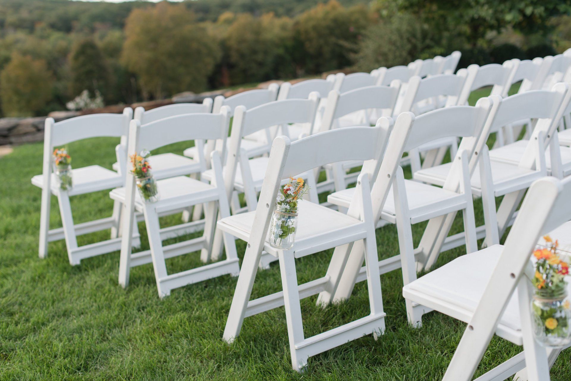 White Chairs at Vineyard Wedding Venue