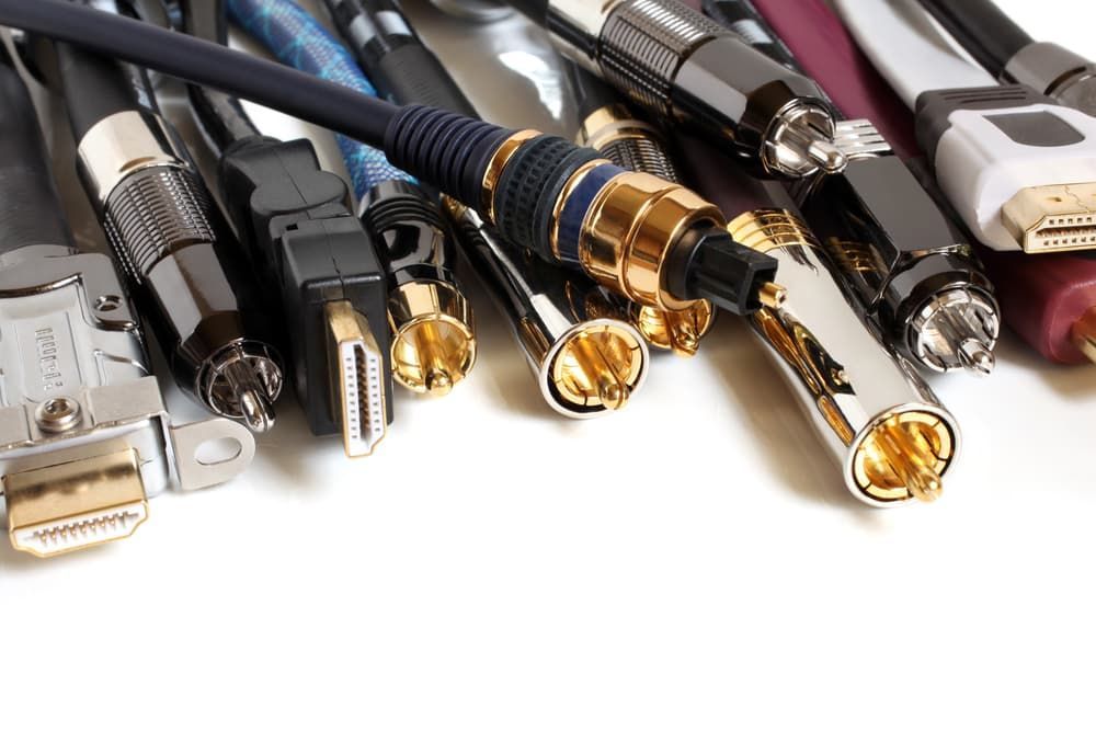 A Bunch of Different Types of Cables on a White Surface — Leading Edge Computers in Forster, NSW