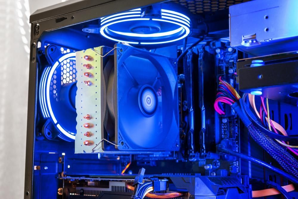 The Inside of a Computer Case With a Blue Light on It — Leading Edge Computers in Forster, NSW