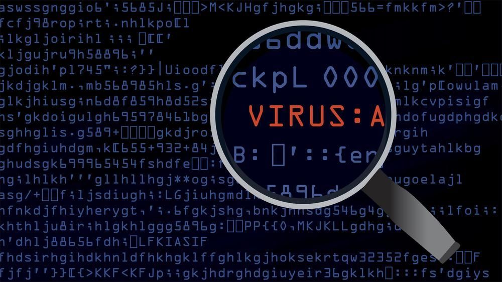 A Magnifying Glass Shows the Word Virus on a Computer Screen — Leading Edge Computers in Forster, NSW