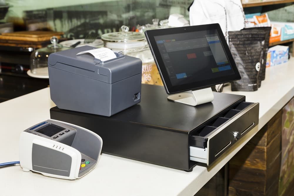 A Cash Register in a Restaurant With a Printer and a Tablet — Leading Edge Computers in Forster, NSW