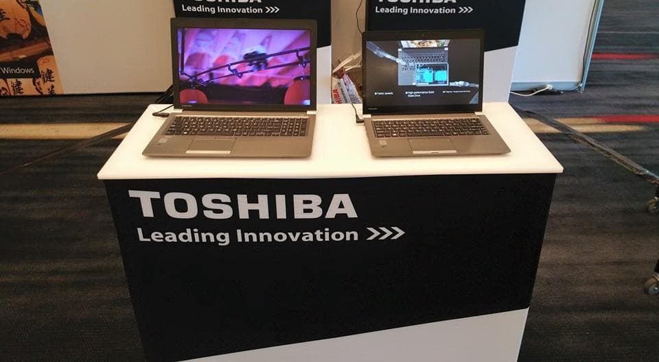 Two Toshiba Laptops Are on Display on a Table — Leading Edge Computers in Forster, NSW