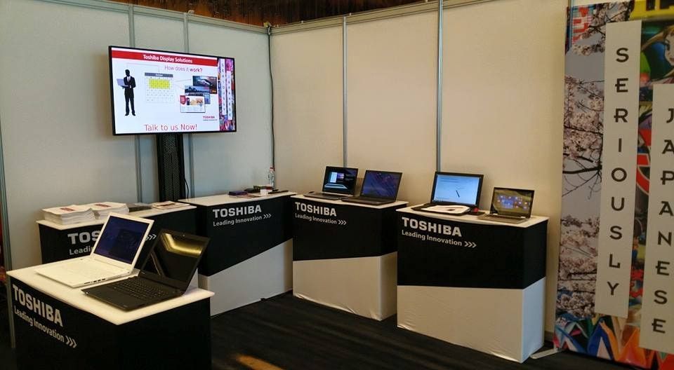 Several Laptops Are on Display at a Toshiba Booth — Leading Edge Computers in Forster, NSW