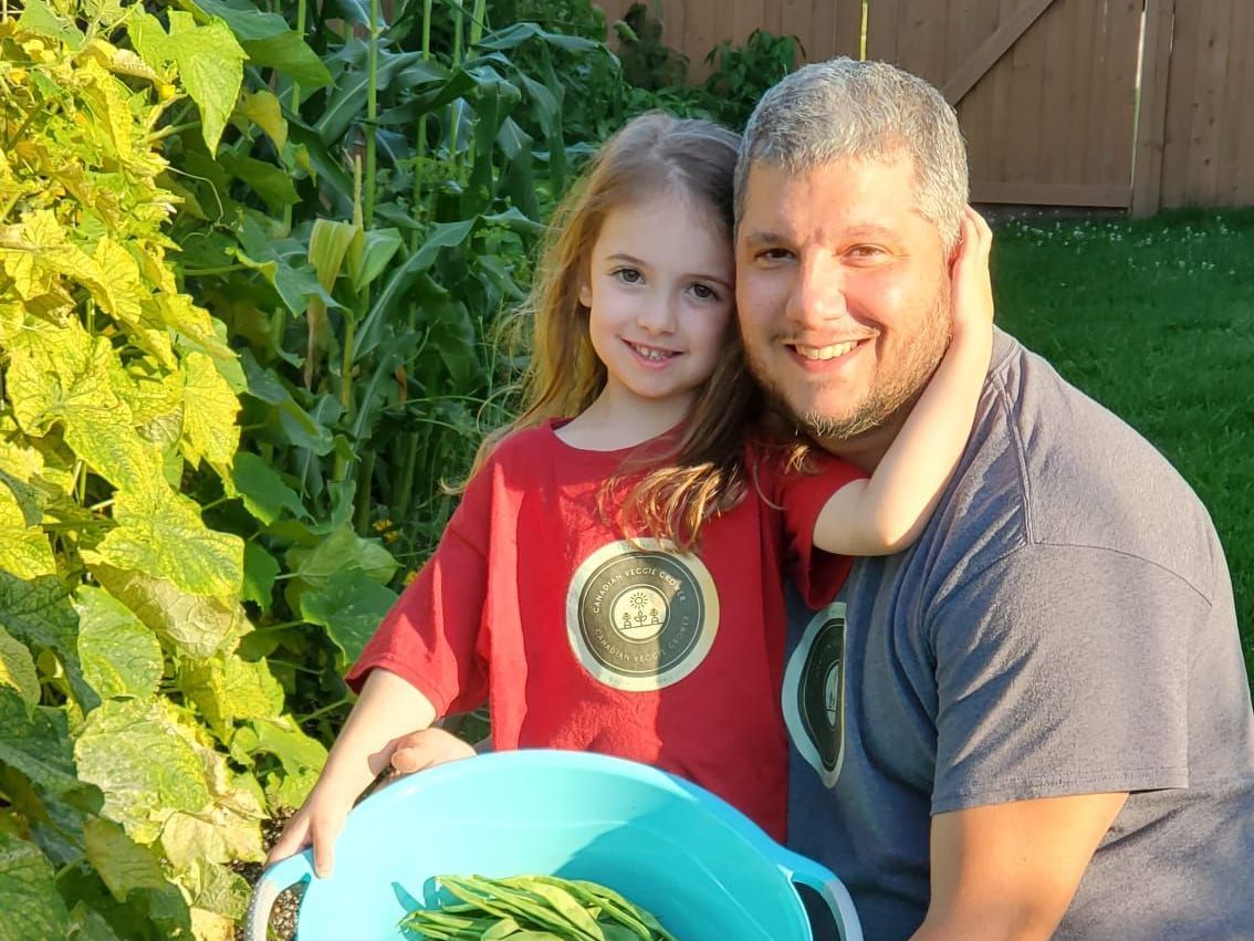 Teaching greenhouse gardening with family in Canada