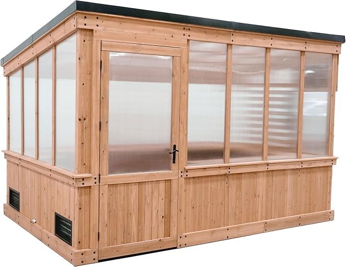 Wooden backyard greenhouse used for year round growing