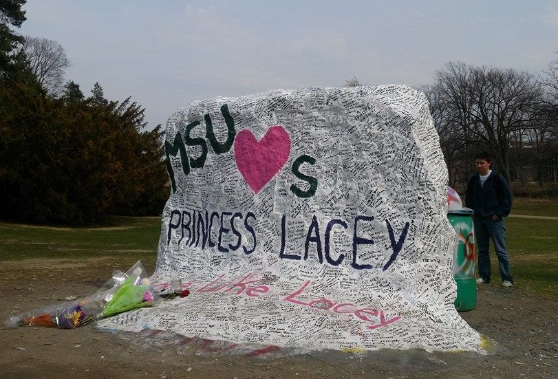 A large rock covered in white paint with
