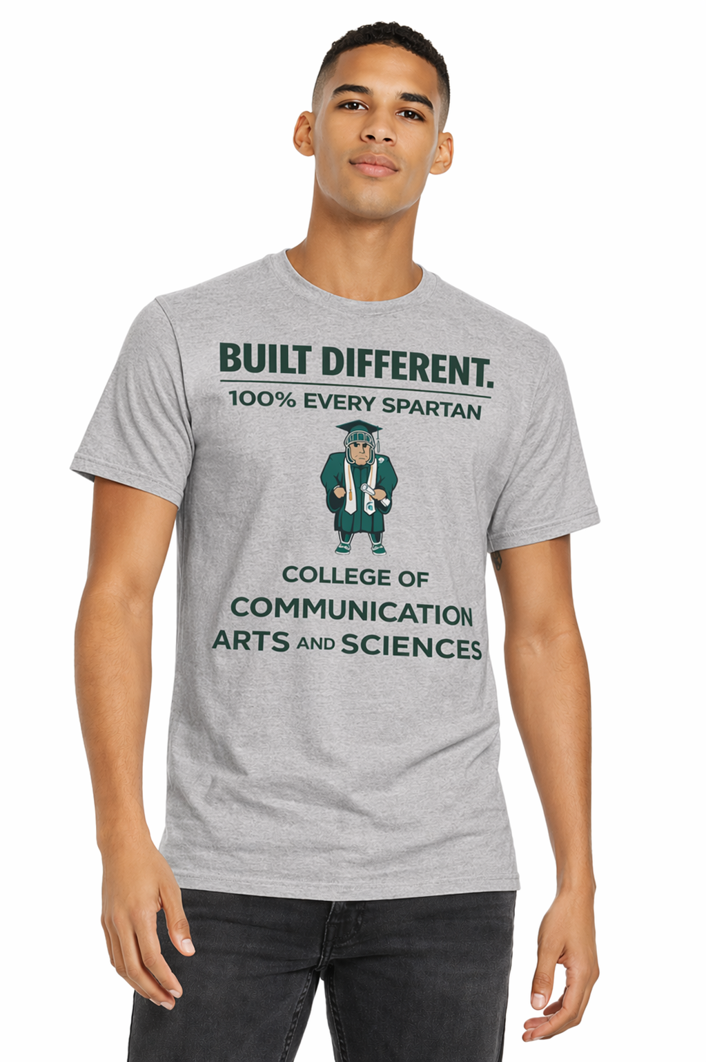Gray T-shirt with “Built Different” text and a Spartan graphic promoting College of Communication Arts and Sciences