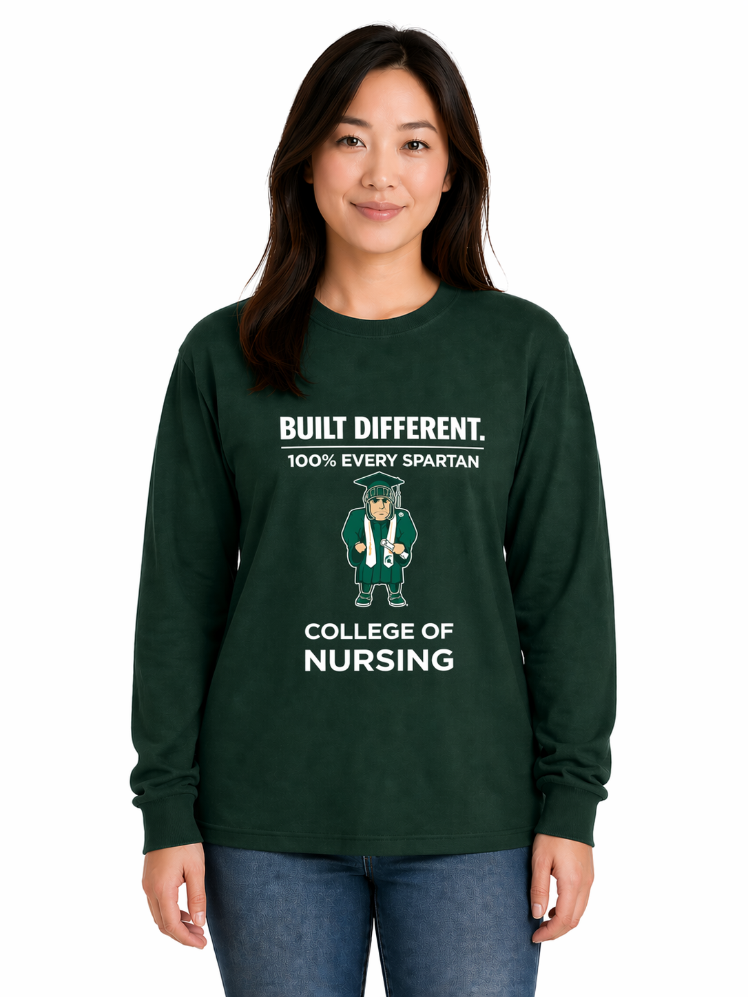 Woman wearing a green College of Nursing sweatshirt with “Built Different” text, standing against a white background