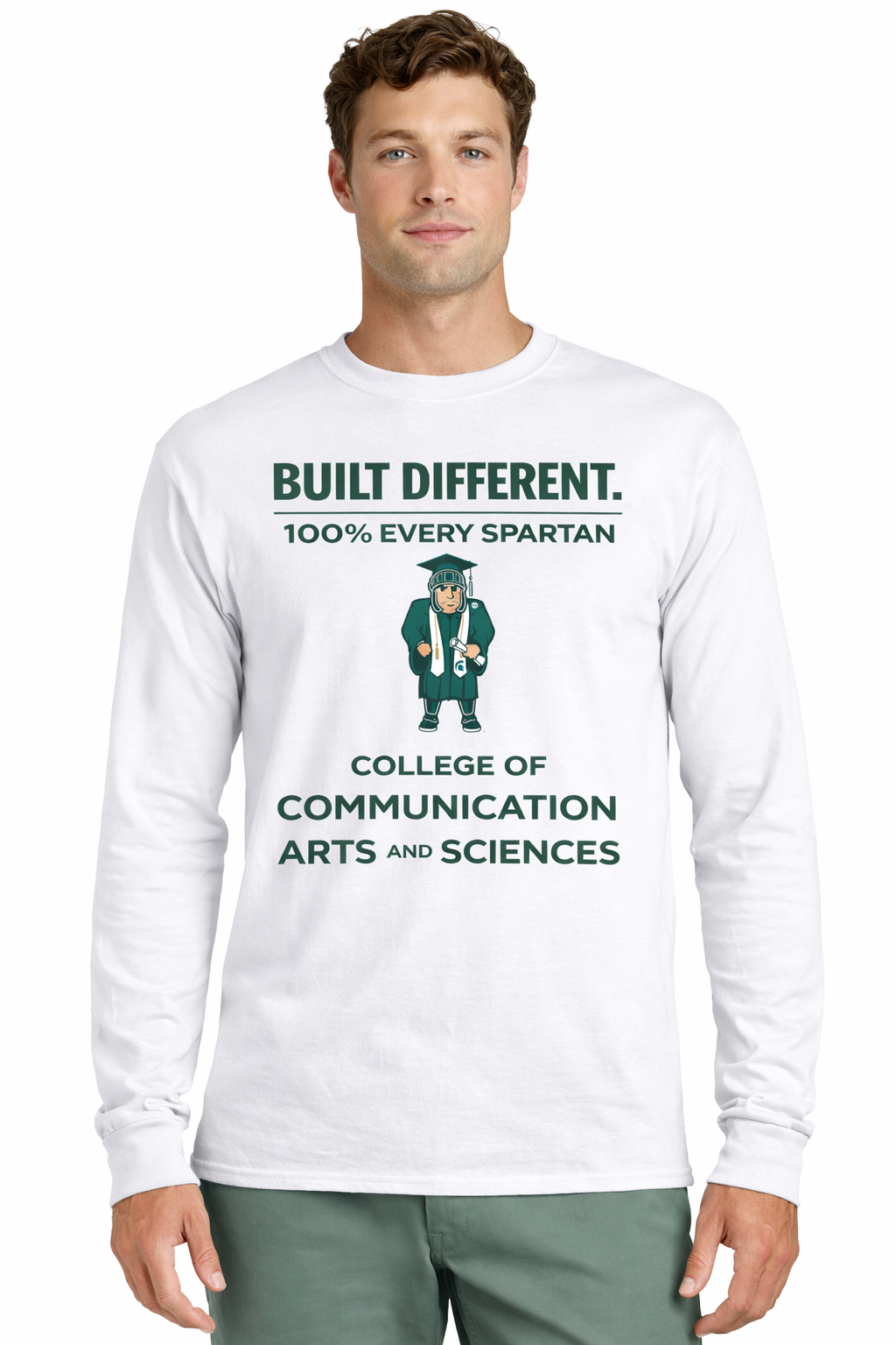A man wears a white long-sleeve shirt with green text: 