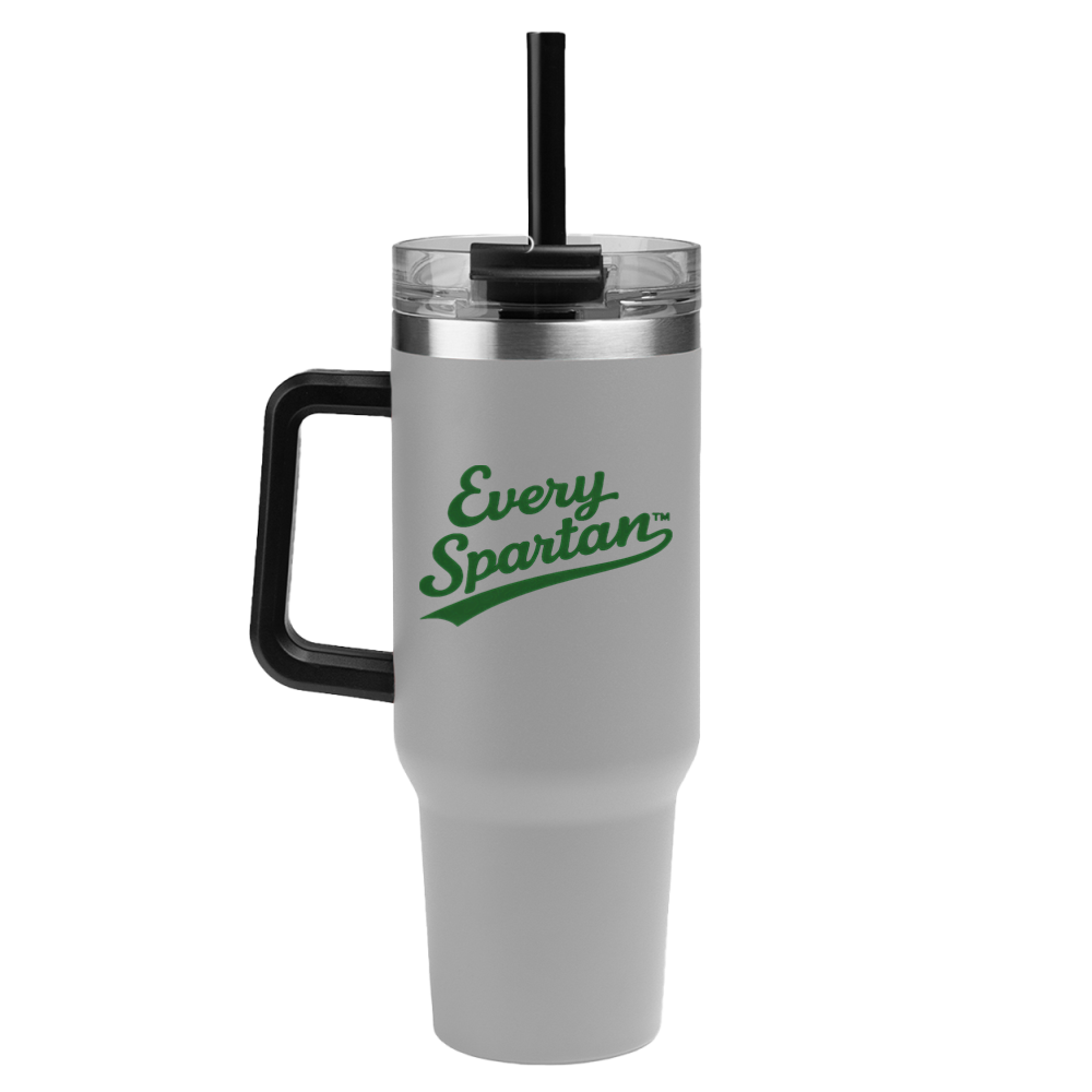 White insulated tumbler with black handle and straw, featuring green 