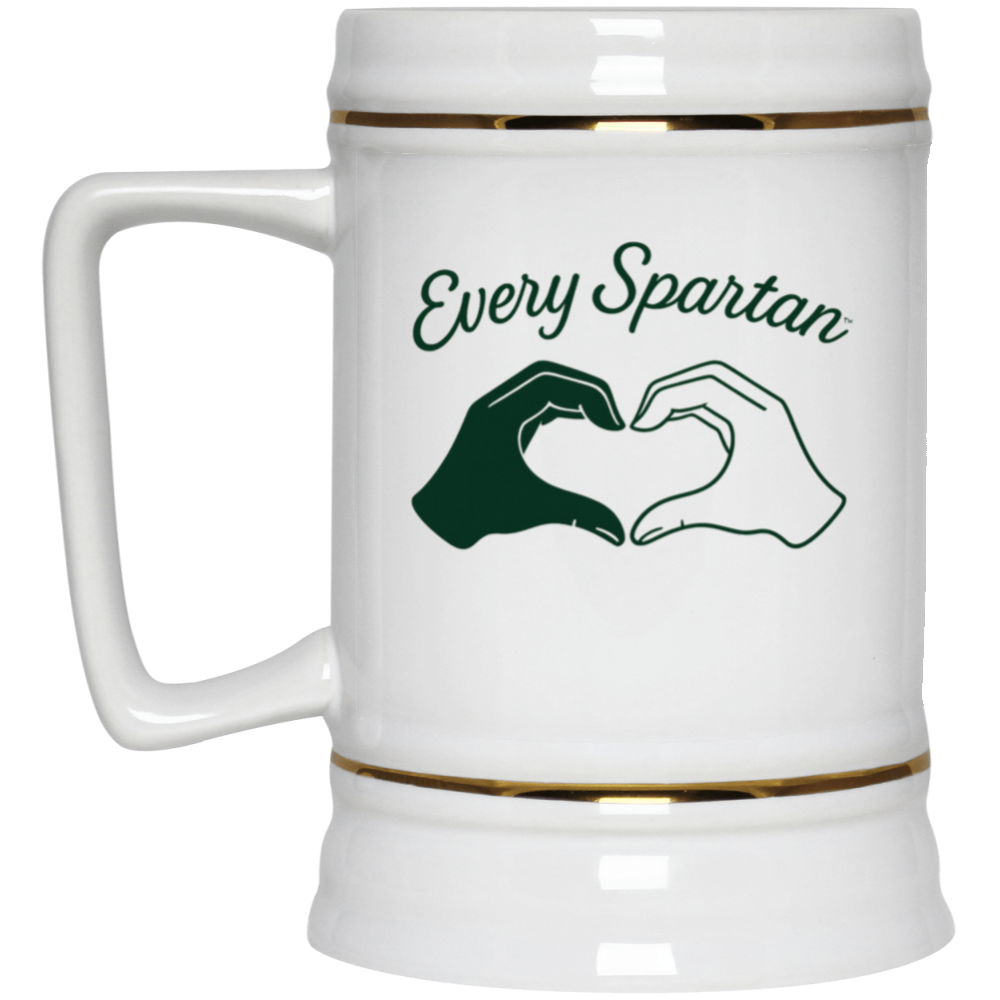 White mug with green “Every Spartan” text and two hands forming a heart on the front