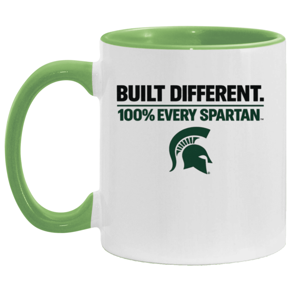 White mug with green handle and rim, printed with “BUILT DIFFERENT. 100% EVERY SPARTAN.” and a Spartan helmet logo