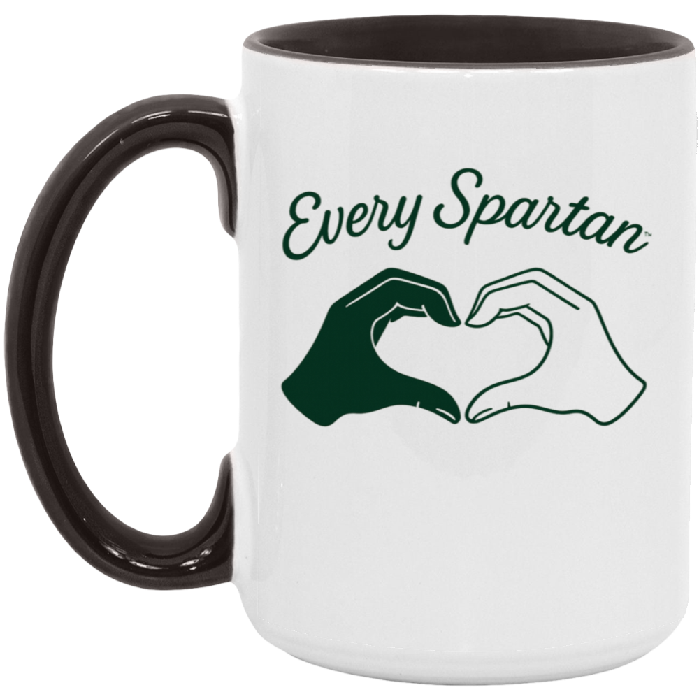 White mug with black handle and green “Every Spartan” text above two hands forming a heart shape.