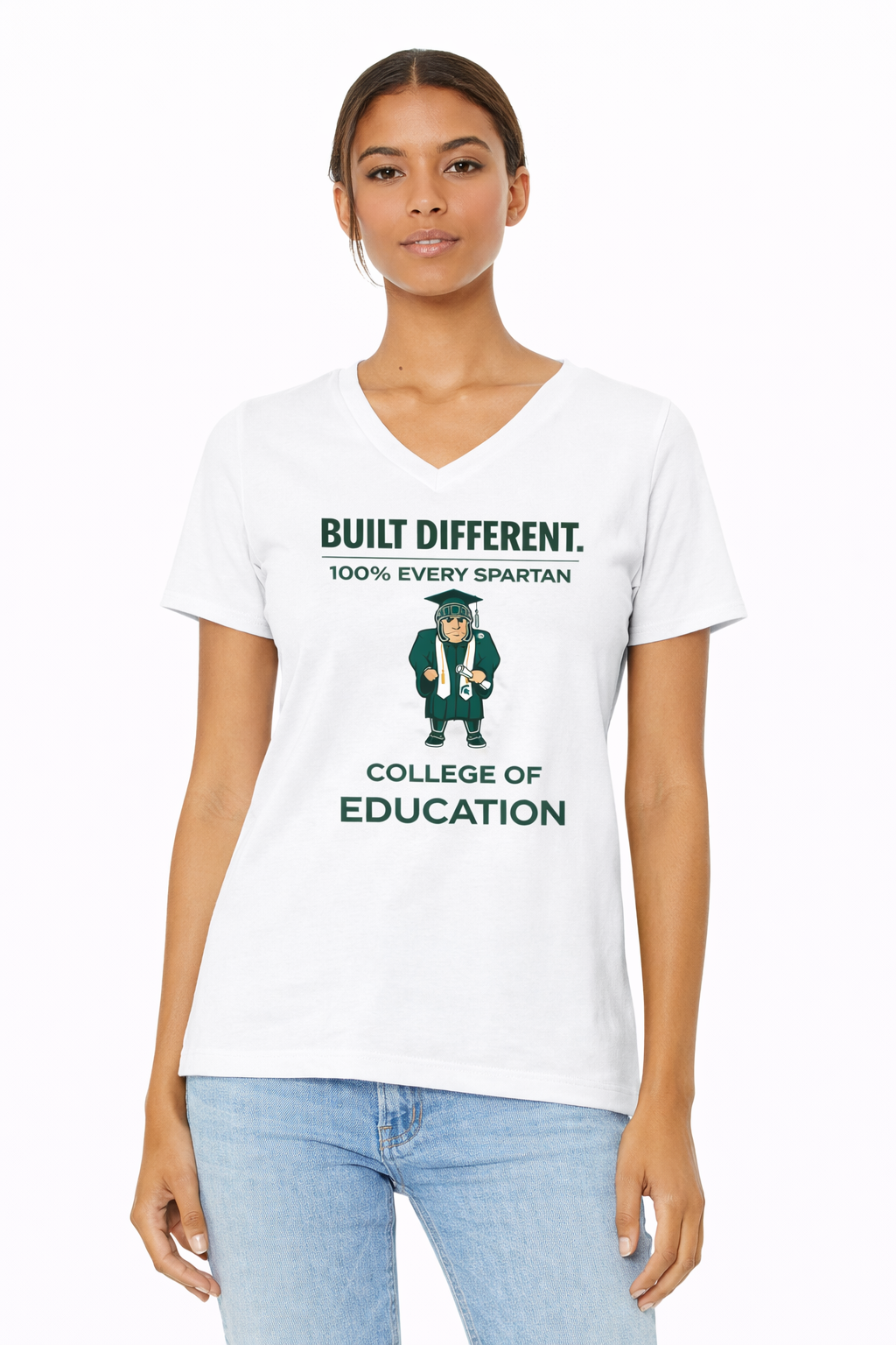 A woman wears a white V-neck t-shirt featuring a green Spartan graduate graphic and text reading