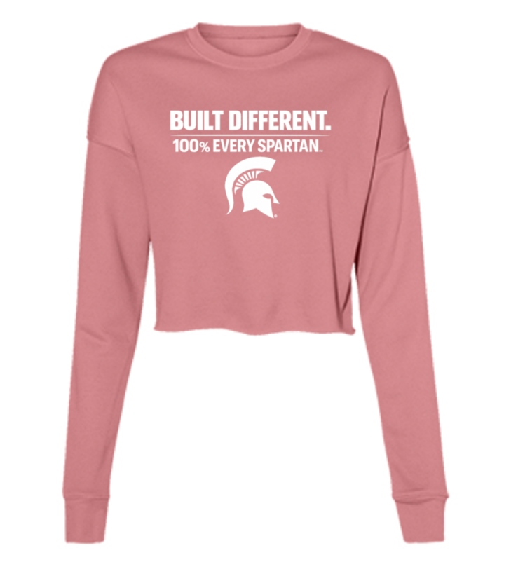Pink long-sleeve crop top with white “Built Different. 100% Every Spartan.” text and Spartan helmet logo