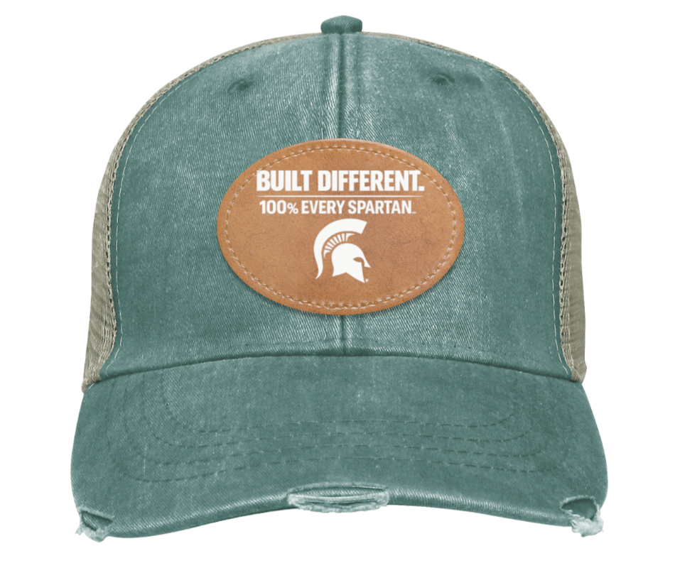 Green trucker hat with tan patch reading “Built Different. 100% Every Spartan.”