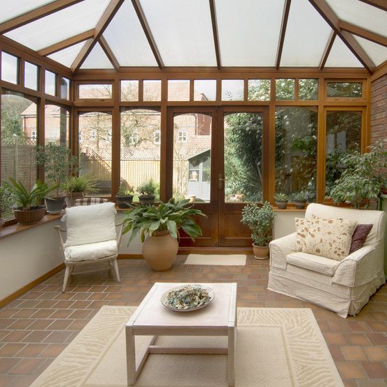 A living room with chairs and a coffee table