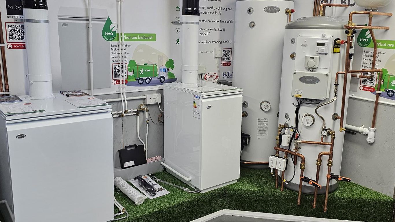 A room filled with lots of appliances and pipes.