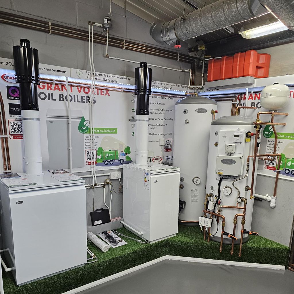 A room filled with lots of boilers and pipes.
