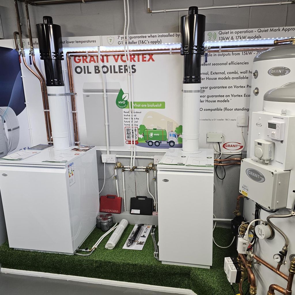 A room with a sign that says grant vortex oil boilers