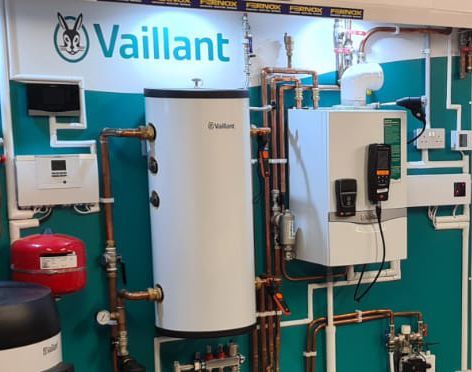 A wall with a sign that says vaillant on it