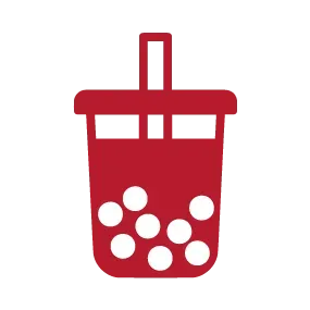 Red bubble tea cup with a straw and white tapioca pearls