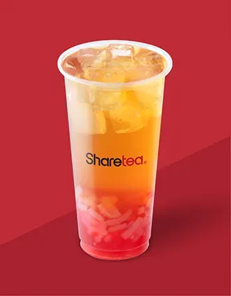 Tall clear cup of iced tea with orange and pink gradient on a red background, labeled “Sharetea.”