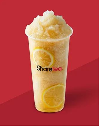 Tall cup of lemon slush with lemon slices on a red background, labeled “Sharetea”