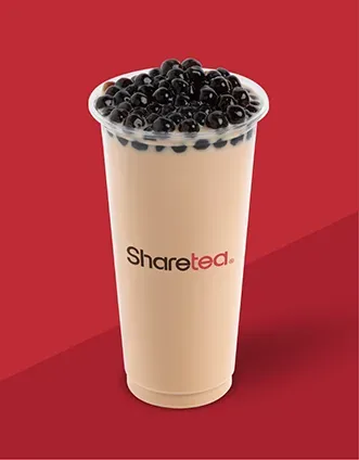 Tall beige cup of bubble tea topped with black pearls, with the Sharetea logo on a red background