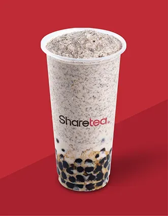 A tall Sharetea bubble tea with tapioca pearls on a red background